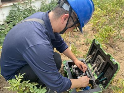 高溫炙烤下的堅守 臨沂移動裝維師傅的通訊守護之路